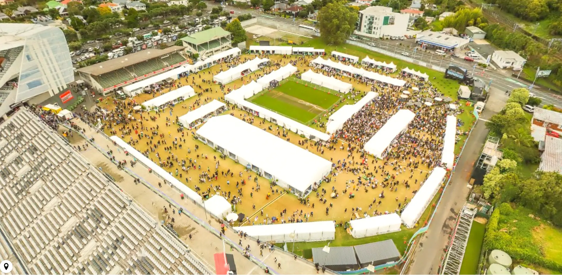 Wide view of a large scale outdoor event, with marquees supplied by Carlton Events Hire 